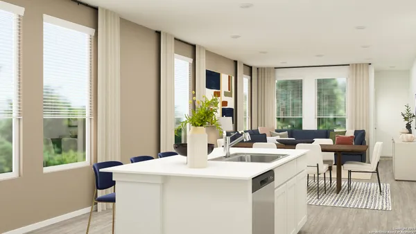 a view of a a dining room with furniture window and outside view