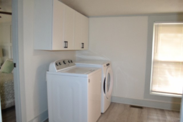450 Cedar Hill Road Celina, TN 38551 - Photo 12 of 74 a utility room with dryer and washer