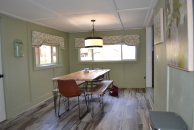 450 Cedar Hill Road Celina, TN 38551 - Photo 15 of 74 a view of a dining room with furniture window and wooden floor