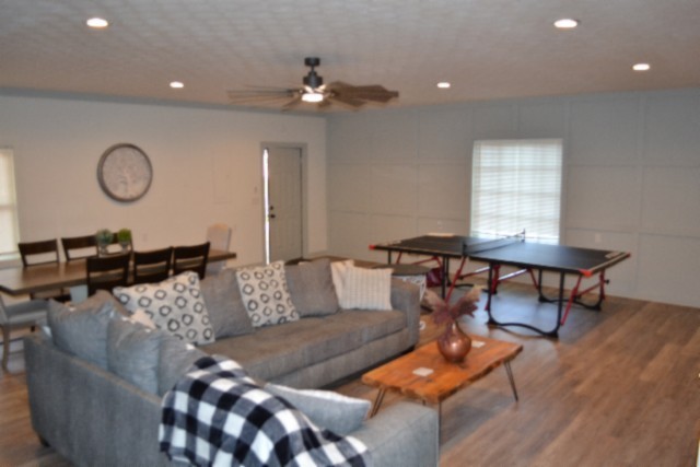 450 Cedar Hill Road Celina, TN 38551 - Photo 22 of 74 a living room with furniture and wooden floor