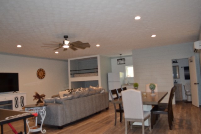 450 Cedar Hill Road Celina, TN 38551 - Photo 26 of 74 a living room with furniture and a flat screen tv