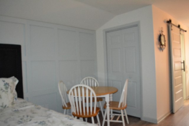 450 Cedar Hill Road Celina, TN 38551 - Photo 40 of 74 a view of a dining room with furniture and wooden floor