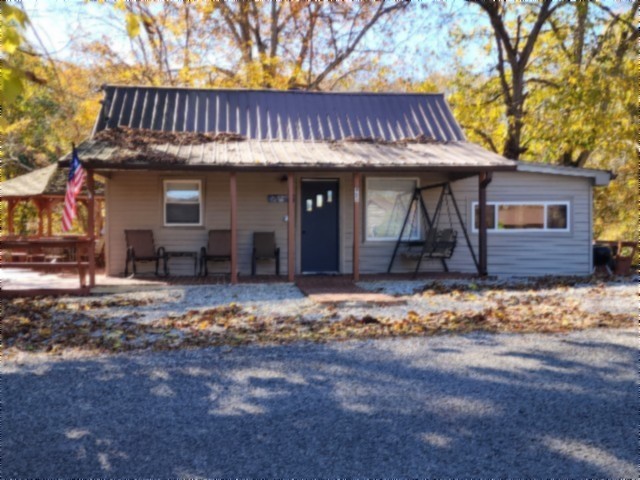 450 Cedar Hill Road Celina, TN 38551 - Photo 46 of 74 a view of a house with a wooden fence