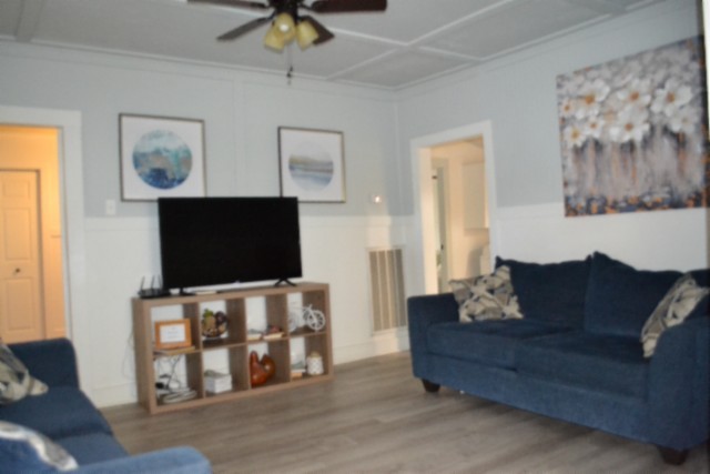 450 Cedar Hill Road Celina, TN 38551 - Photo 8 of 74 a living room with furniture and a flat screen tv