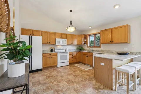 $485,000 | 5495 Quarry Hill Drive, Fitchburg, WI 53711