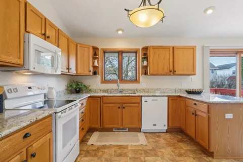 $485,000 | 5495 Quarry Hill Drive, Fitchburg, WI 53711