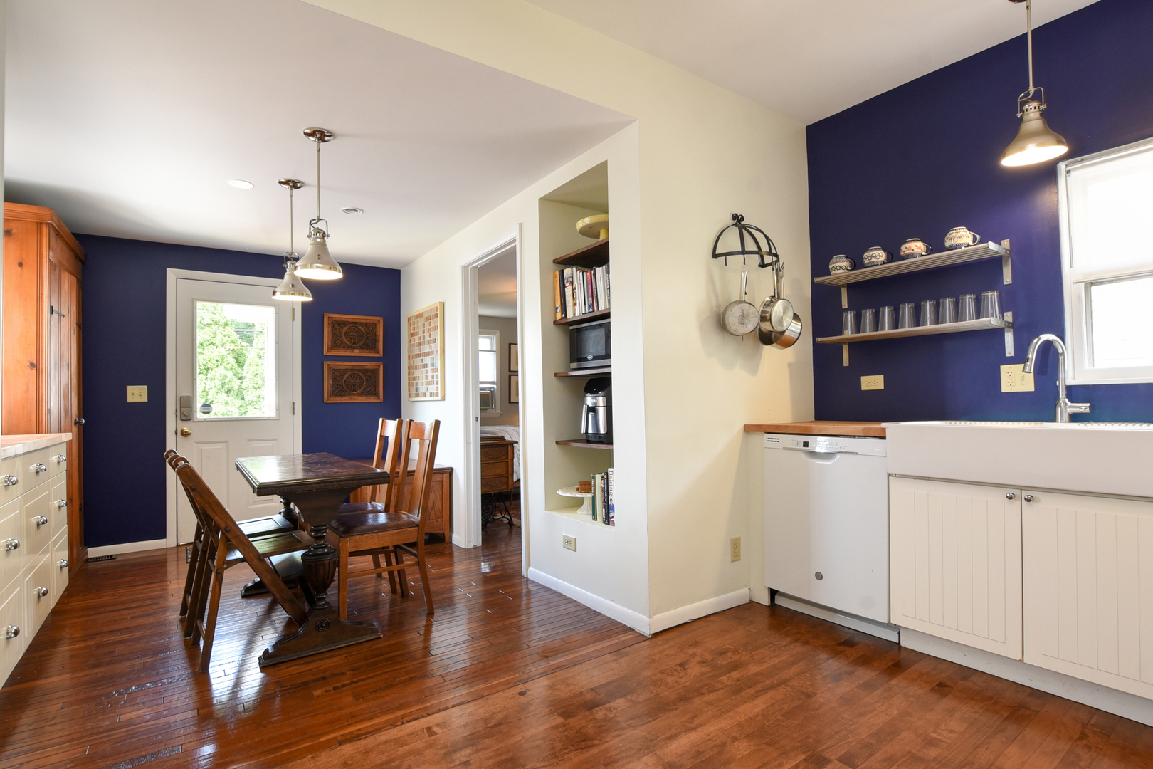 220 East Burlington Street Riverside, IL 60546 - Photo 12 of 31 a view of a workspace with furniture and a kitchen