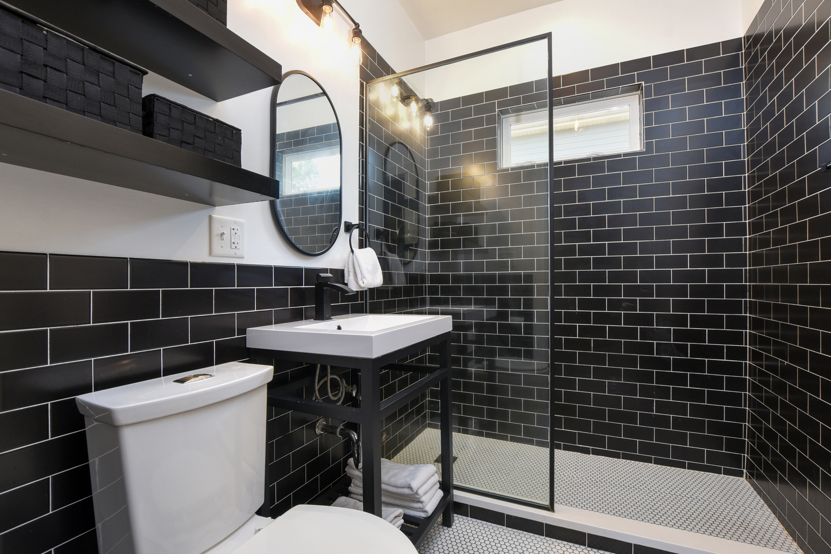 220 East Burlington Street Riverside, IL 60546 - Photo 14 of 31 a bathroom with a sink a toilet and shower