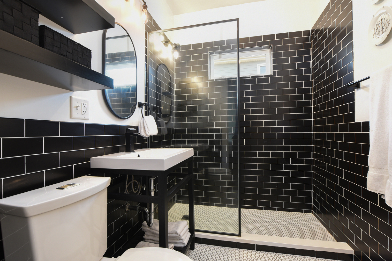 220 East Burlington Street Riverside, IL 60546 - Photo 15 of 31 a bathroom with a sink toilet and shower