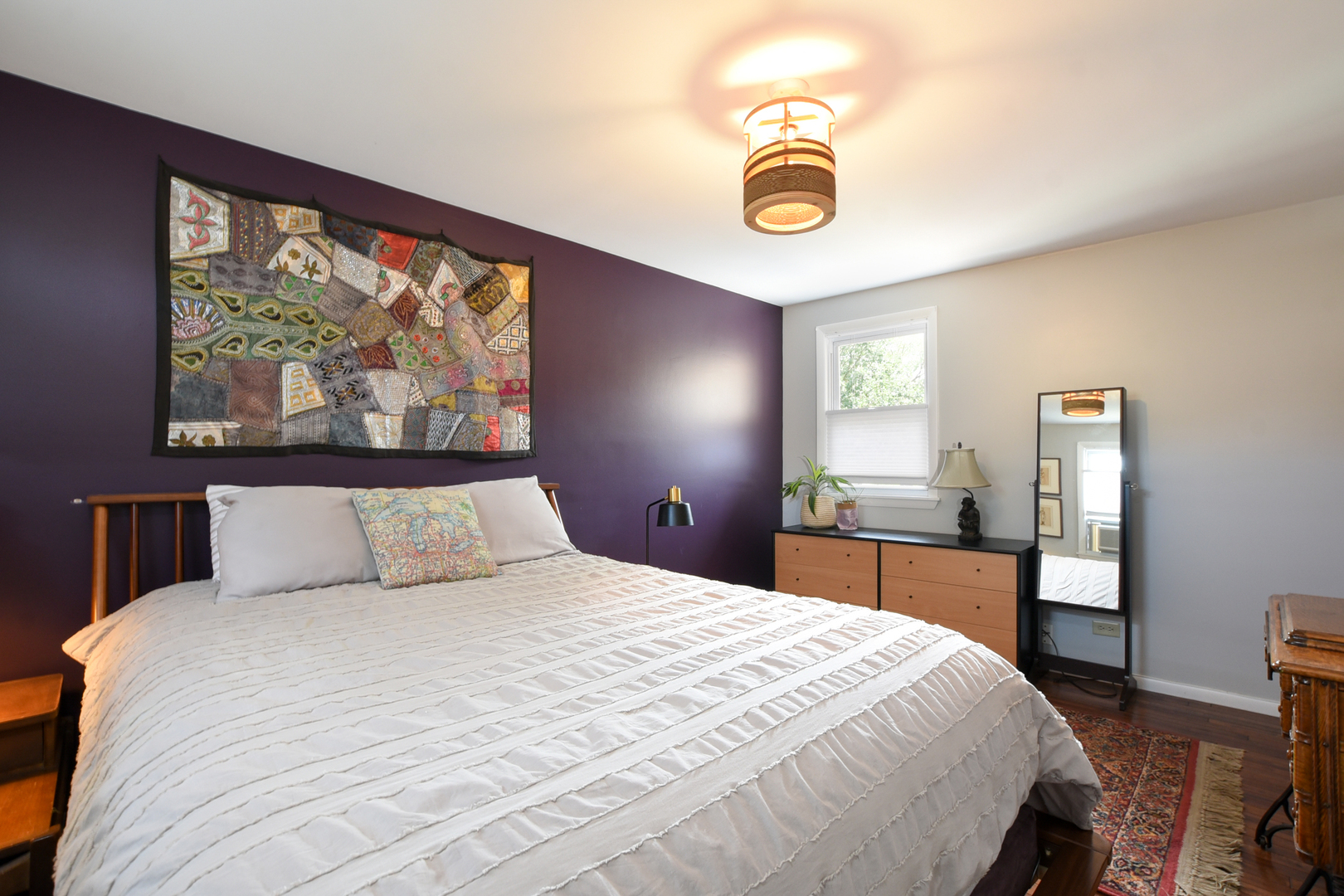 220 East Burlington Street Riverside, IL 60546 - Photo 18 of 31 a bedroom with a large bed and a large window