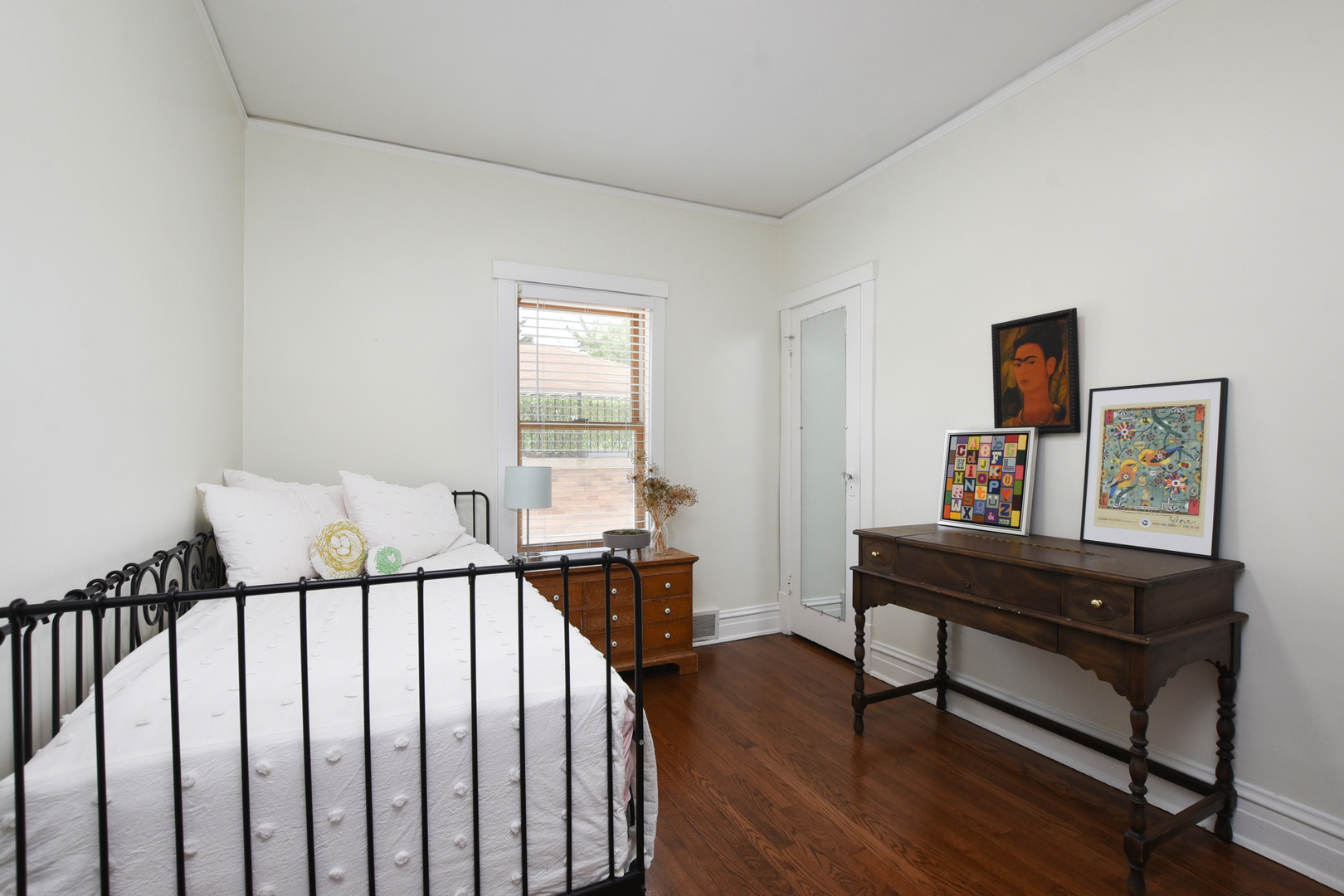 220 East Burlington Street Riverside, IL 60546 - Photo 19 of 31 a bedroom with furniture and a window