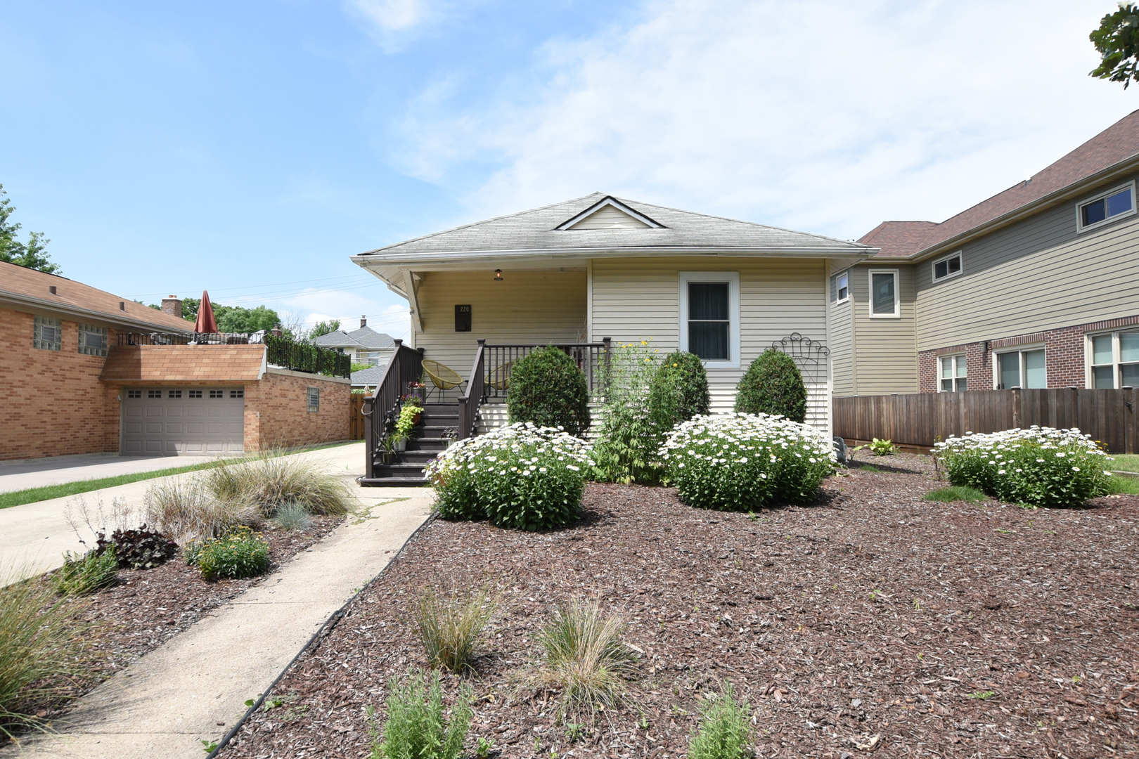 220 East Burlington Street Riverside, IL 60546 - Photo 2 of 31 a front view of a house with garden