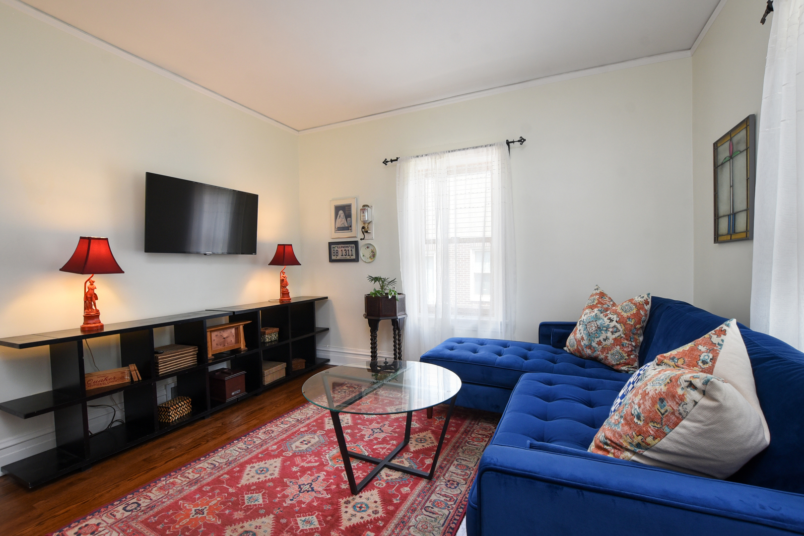 220 East Burlington Street Riverside, IL 60546 - Photo 5 of 31 a living room with furniture and a flat screen tv