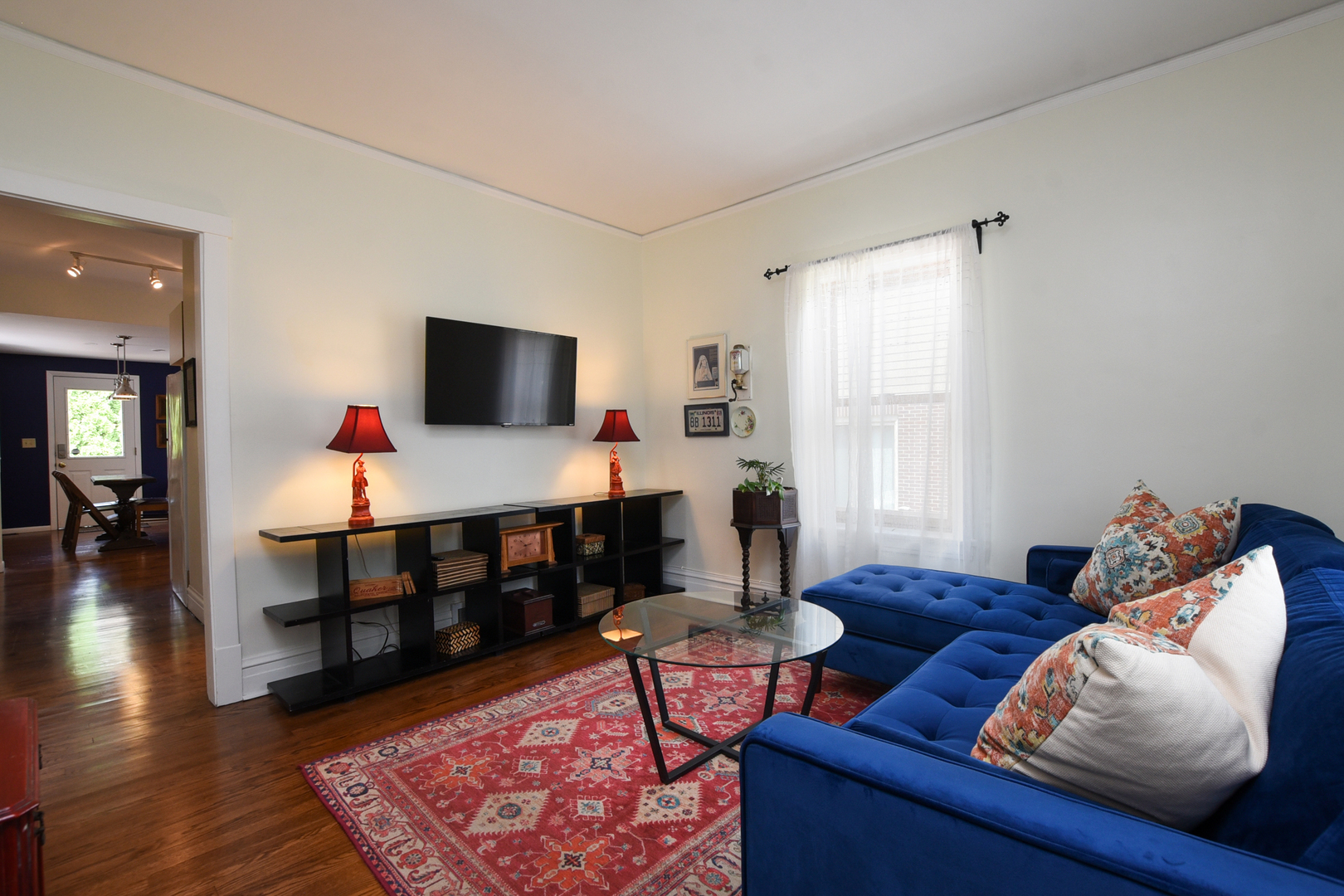 220 East Burlington Street Riverside, IL 60546 - Photo 6 of 31 a living room with furniture and a flat screen tv