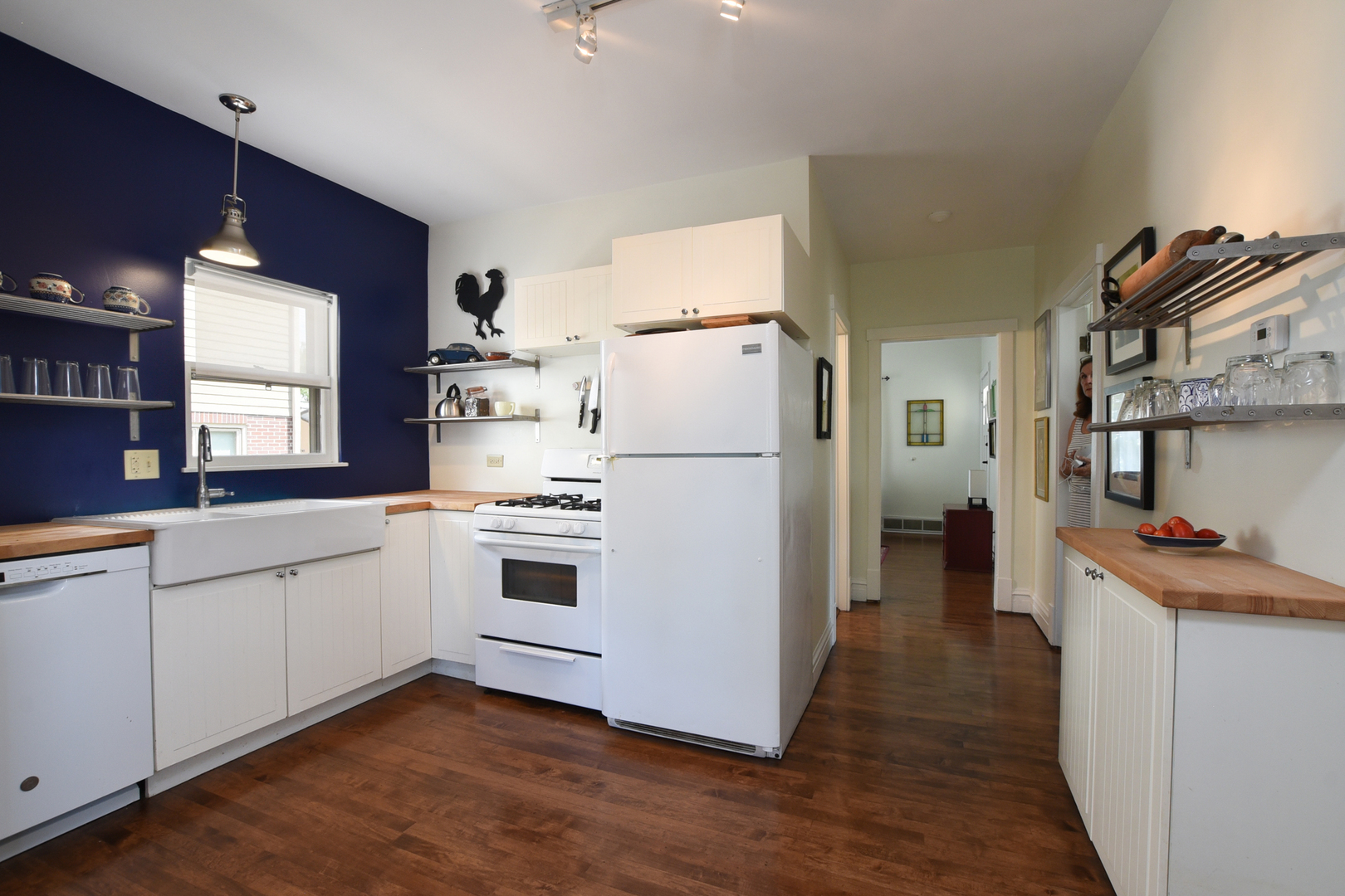 220 East Burlington Street Riverside, IL 60546 - Photo 8 of 31 a kitchen with stainless steel appliances a refrigerator sink and white cabinets