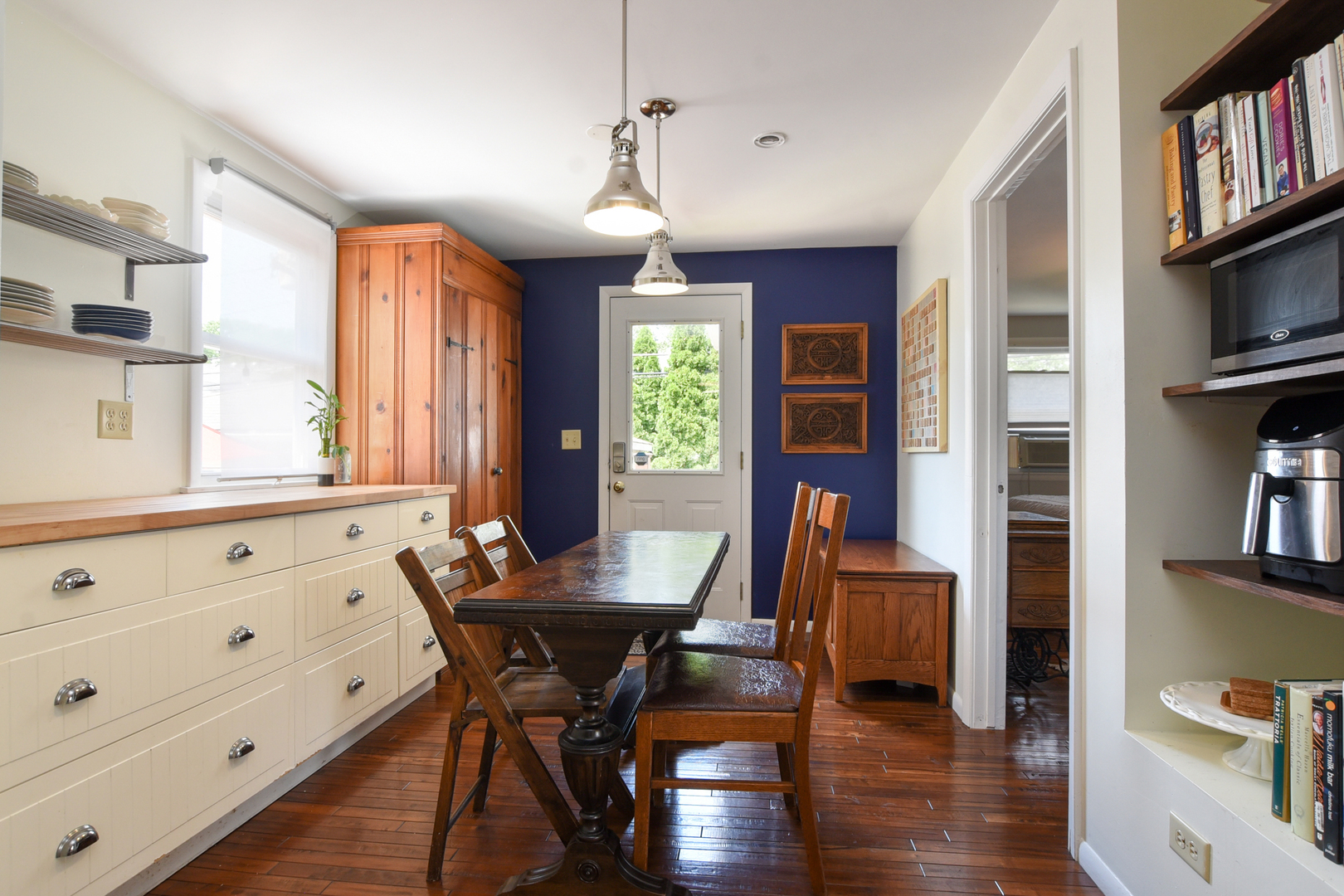 220 East Burlington Street Riverside, IL 60546 - Photo 10 of 31 a view of a dining room with furniture and a window