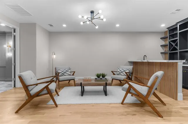 a kitchen with a sink and cabinets