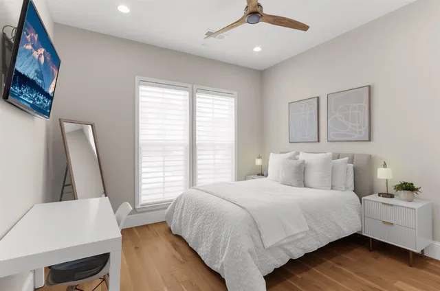 a bathroom with a sink vanity granite and a mirror