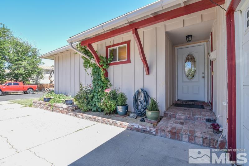 1450 Kirkham Way Reno, NV 89503 - Photo 1 of 20 a front view of a house with garden