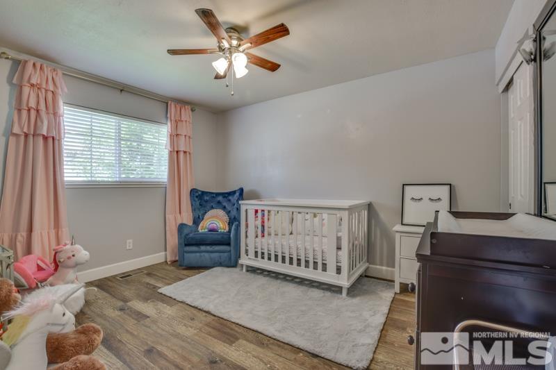 1450 Kirkham Way Reno, NV 89503 - Photo 12 of 20 a bedroom with furniture and a window