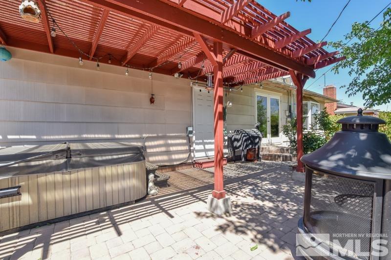 1450 Kirkham Way Reno, NV 89503 - Photo 17 of 20 a view of a backyard with a patio