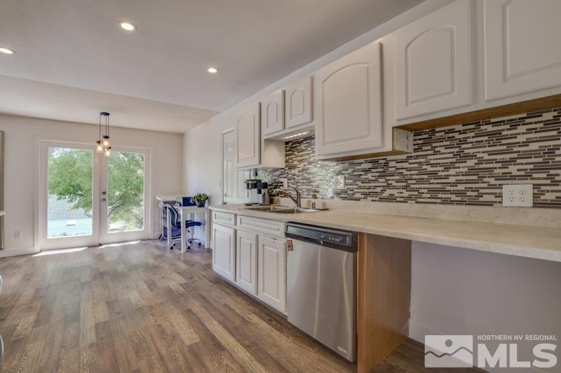 1450 Kirkham Way Reno, NV 89503 - Photo 3 of 20 a kitchen with a sink and cabinets