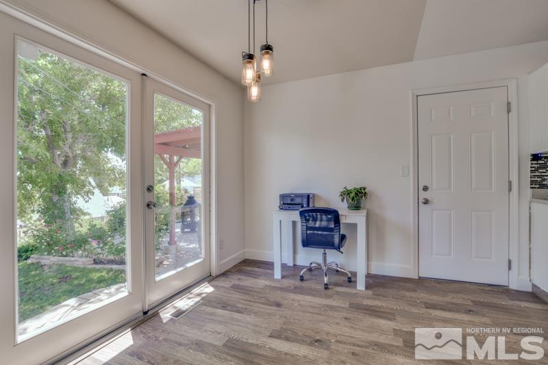 1450 Kirkham Way Reno, NV 89503 - Photo 6 of 20 a view of a workspace with furniture and a window
