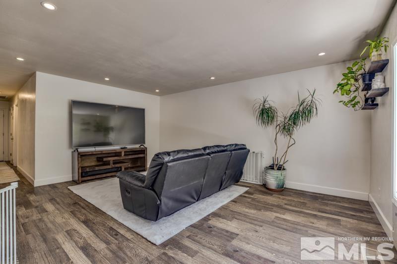 1450 Kirkham Way Reno, NV 89503 - Photo 7 of 20 a living room with furniture and a flat screen tv