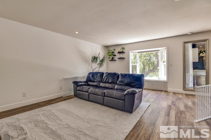 1450 Kirkham Way Reno, NV 89503 - Photo 8 of 20 a living room with a couch and a window