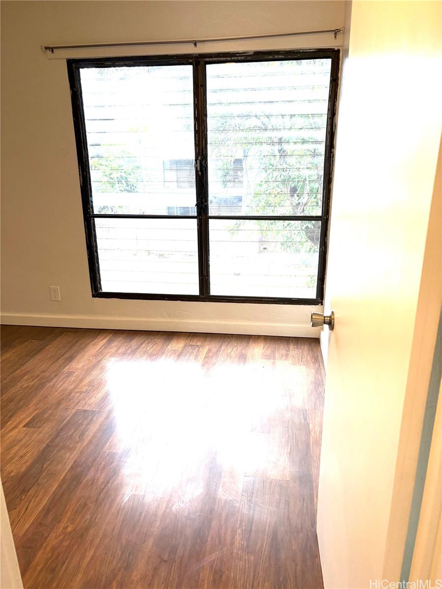 87-122 Helelua Street, Unit C204 Waianae, HI 96792 - Photo 6 of 14 a view of a room that has a window in it