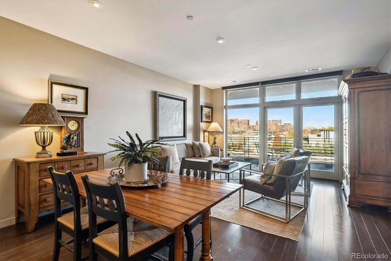 333 South Monroe Street, Unit 310 Denver, CO 80209 - Photo 11 of 33 a dining room with furniture window and wooden floor
