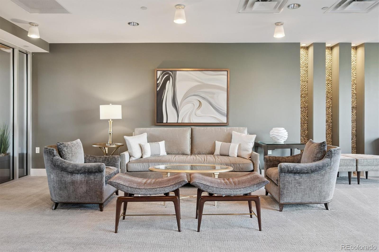 333 South Monroe Street, Unit 310 Denver, CO 80209 - Photo 27 of 33 a living room with furniture a lamp and a potted plant