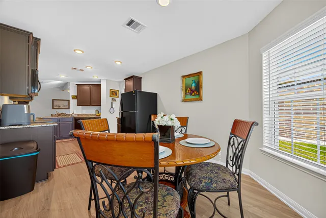a view of a dining room with furniture