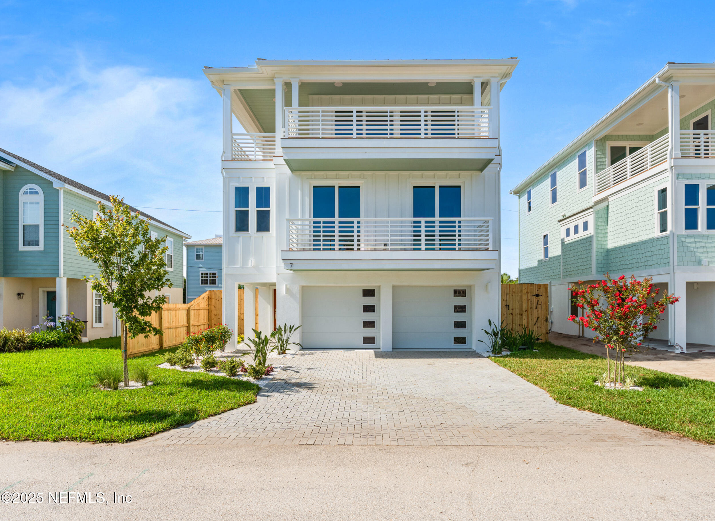 7 13th Street St. Augustine, FL 32080 - Photo 1 of 30 front view of a building with a yard