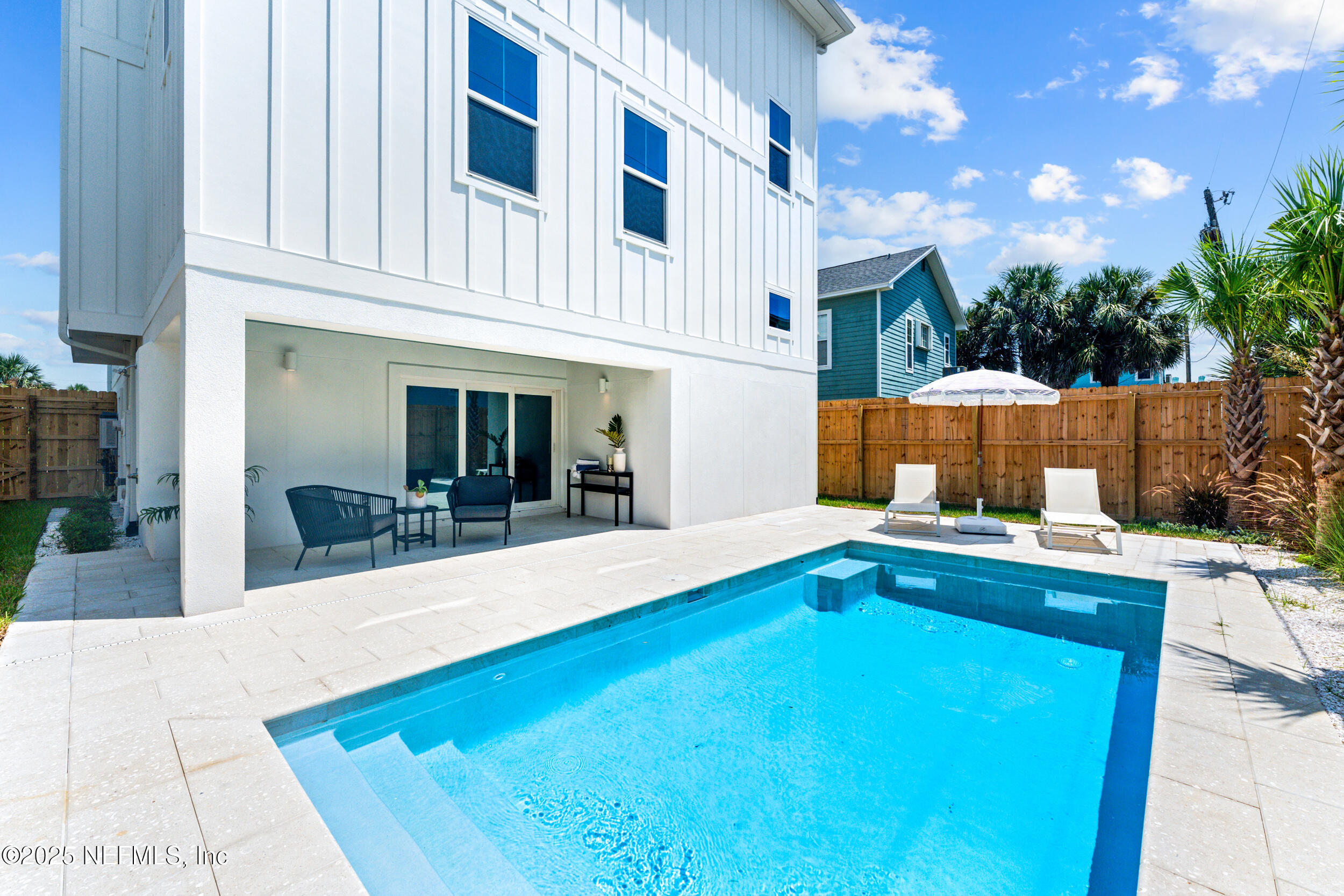 7 13th Street St. Augustine, FL 32080 - Photo 25 of 30 a view of swimming pool with outdoor seating