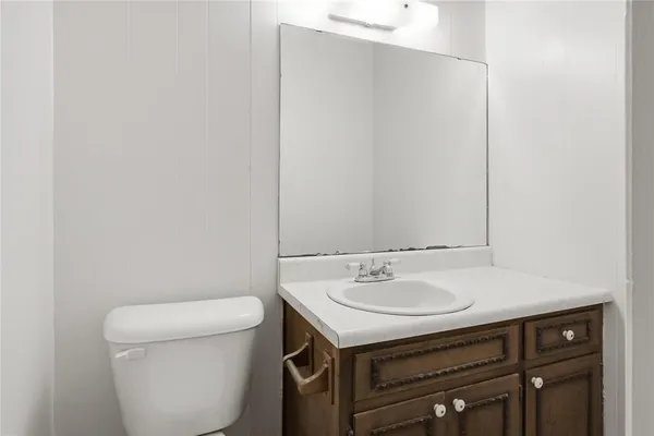 a bathroom with a sink and a toilet