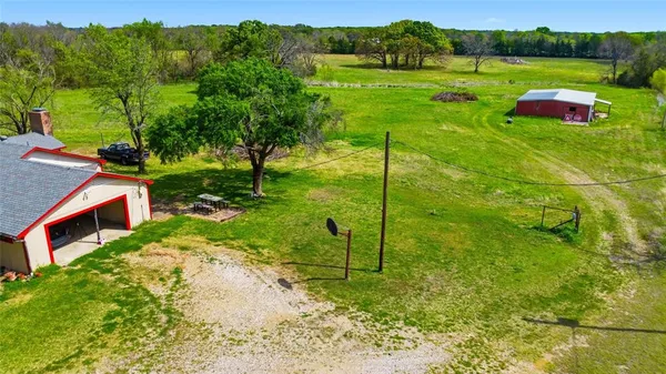 a view of backyard with green space