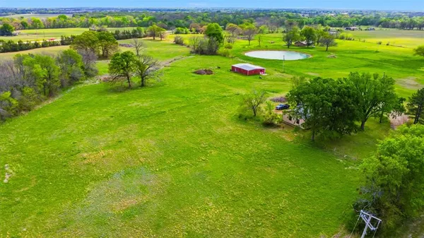 a view of a golf course with a lake
