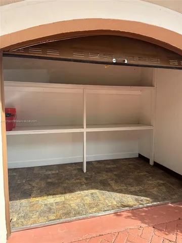 a view of a house with swimming pool patio and porch