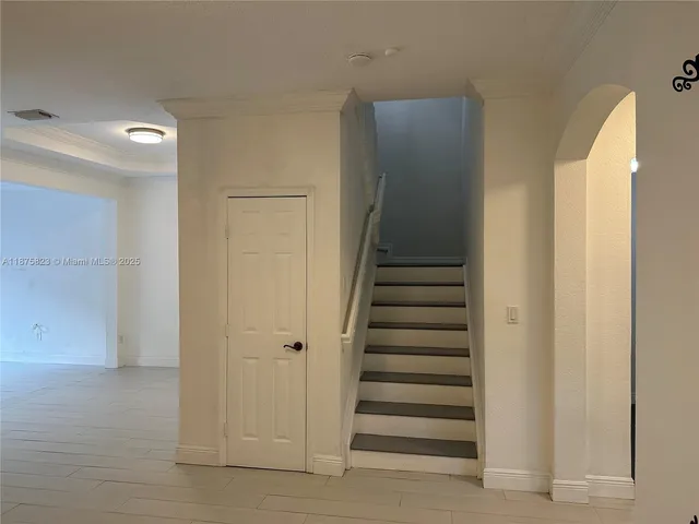 a view of entryway with stairs