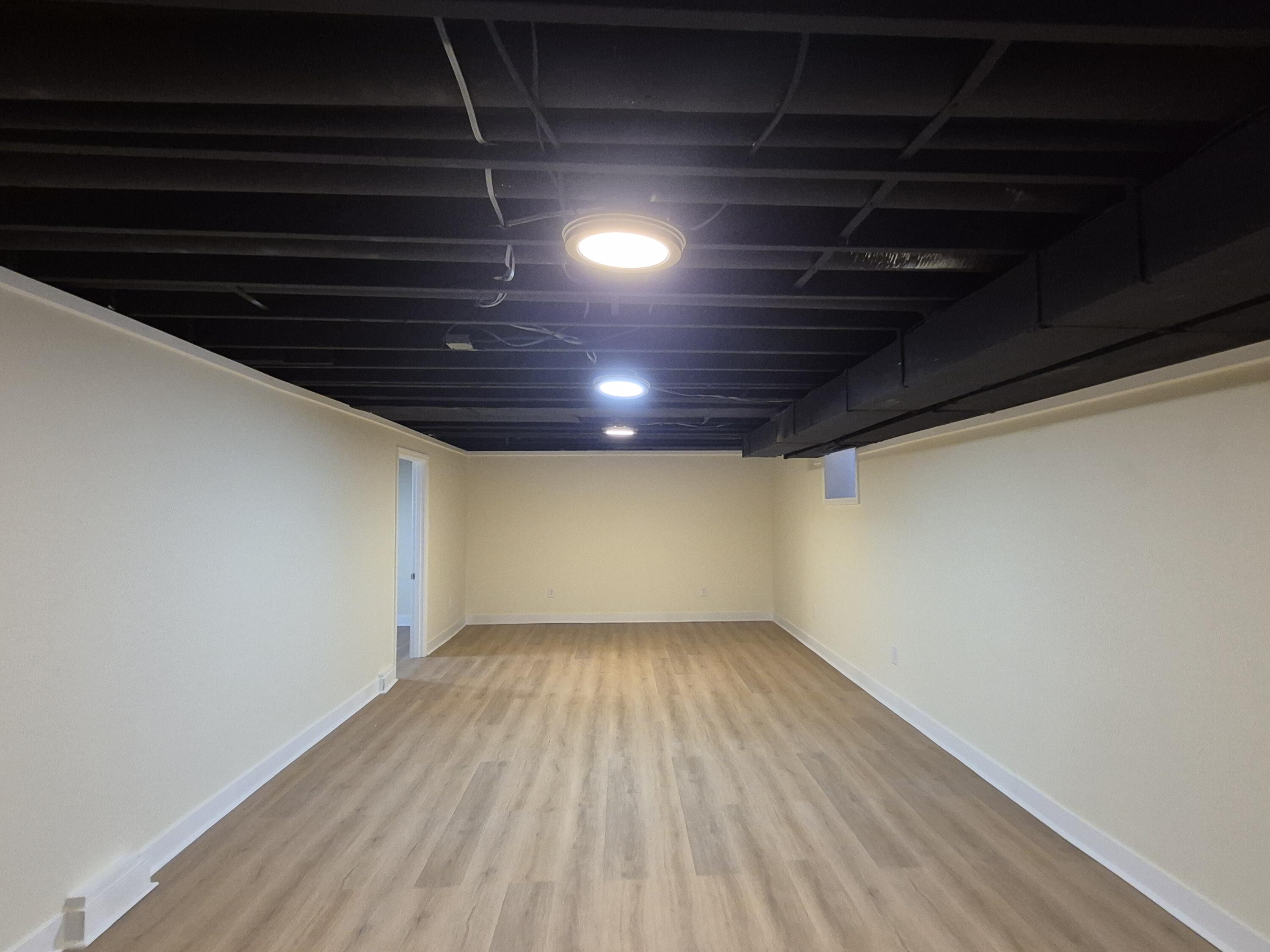 308 Pierce Street Gary, IN 46402 - Photo 17 of 23 a view of empty room with wooden floor