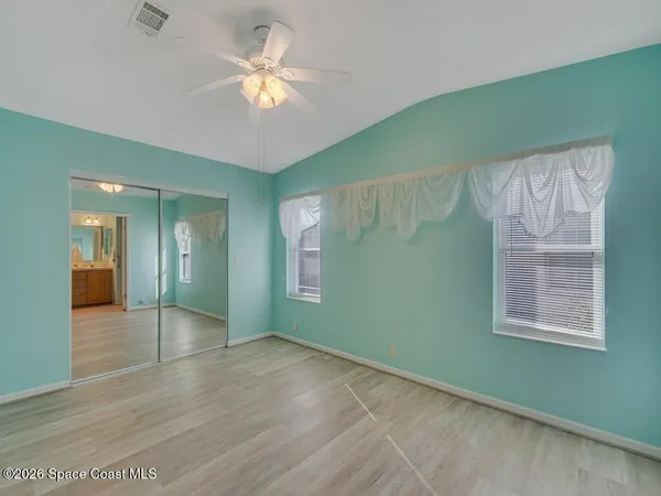a view of a swimming pool with outdoor seating
