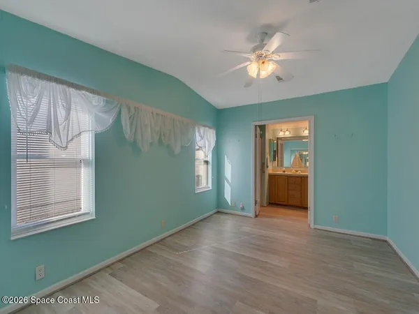 a view of balcony with furniture