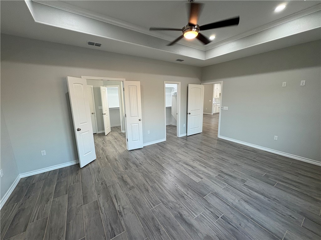 2533 Hewlett Ingleside, TX 78362 - Photo 12 of 23 wooden floor in an empty room with a window