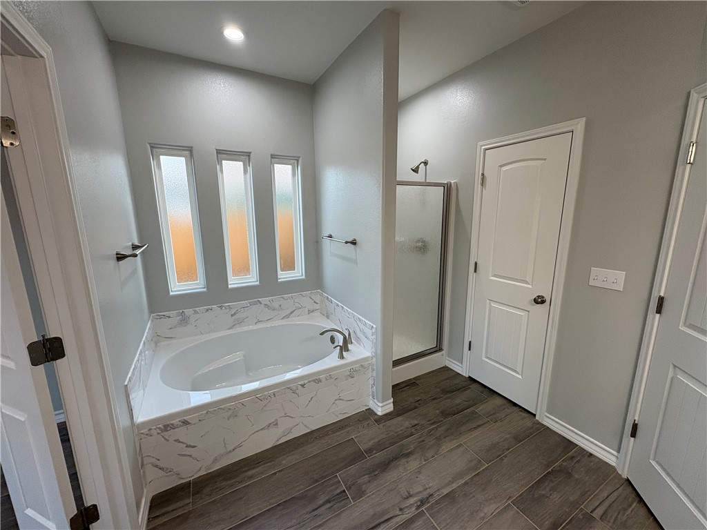 2533 Hewlett Ingleside, TX 78362 - Photo 15 of 23 a bathroom with a tub shower and sink