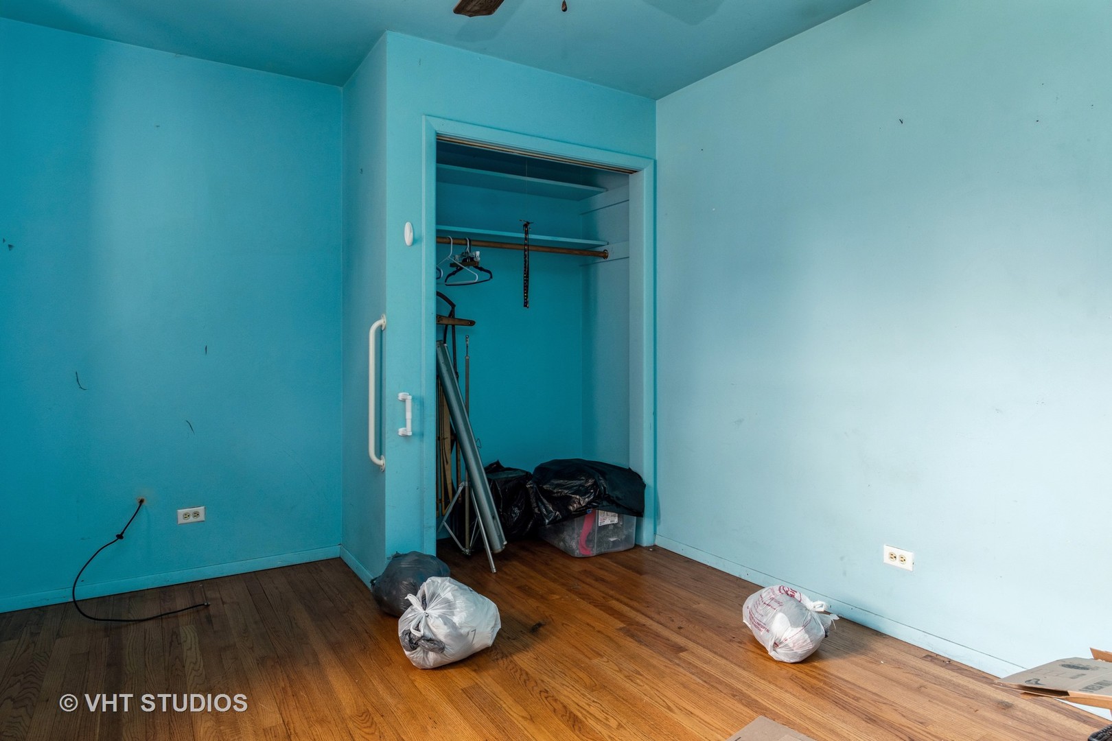 1004 Riedy Road Lisle, IL 60532 - Photo 9 of 14 a view of a room with wooden floor and lounge chair
