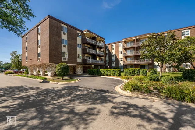 a view of a building with a street