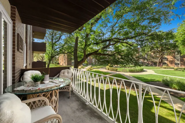 a view of balcony with furniture