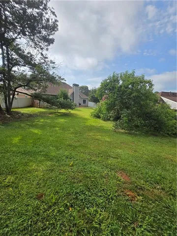 a city view with tall trees