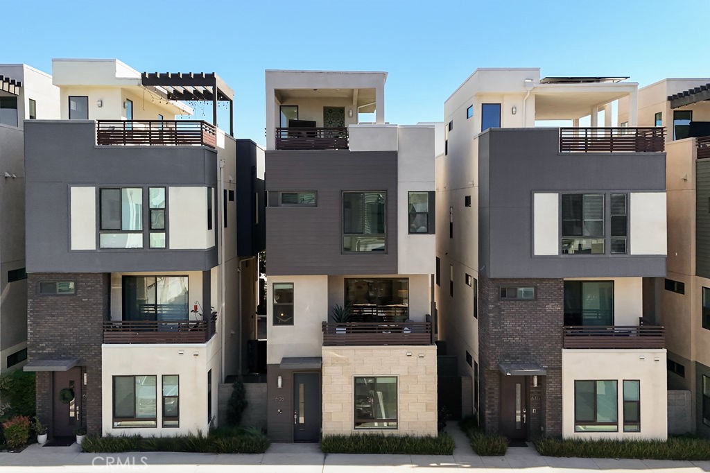 608 Malibu Costa Mesa, CA 92627 - Photo 1 of 1 a front view of a multi story building